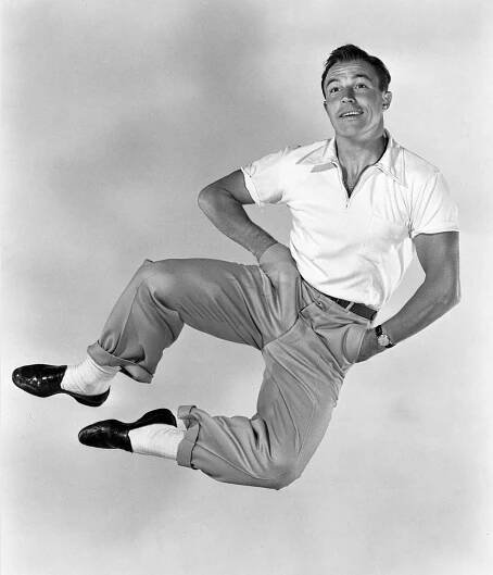 Gene Kelly: *23.8.1912 – †2.2.1996, americký tanečník, choreograf, herec a režisér