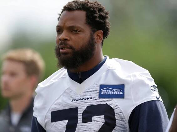 Michael Bennett sits during national anthem after Charlottesville protests
