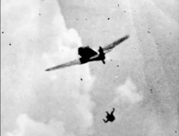 A Luftwaffe pilot bails out of his fighter after being hit : r/WWIIplanes