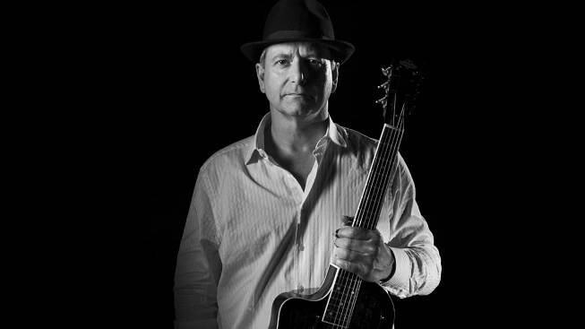 Michael playing resonator guitar