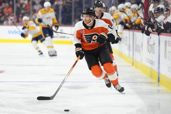 Philadelphia Flyers defenseman Cam York (8) chases the puck against the Nashville Predators in the first period at Wells Fargo Center.