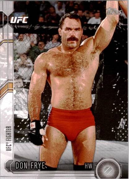 Victorious Don Frye Raising His Arm in Triumph Wallpaper