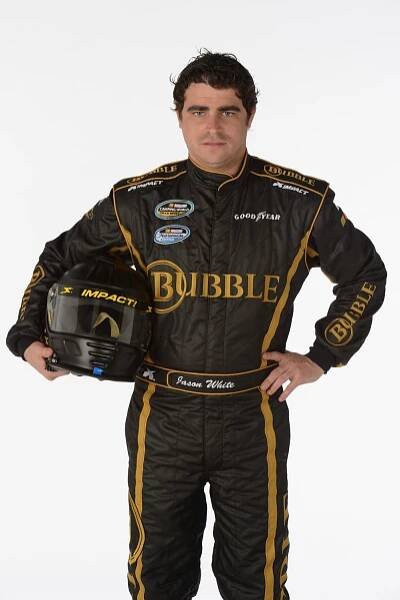 Driver Jason White poses during portraits for the 2013 NASCAR Nationwide Series at Daytona International Speedway
