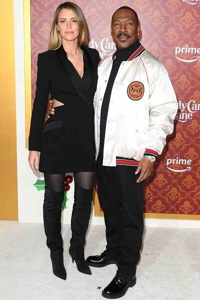 Eddie Murphy and Paige Butcher at the world premiere of Candy Cane Lane