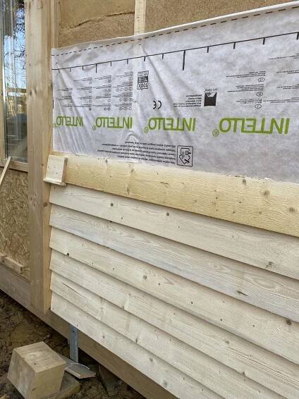 Schichtaufbau: OSB - 20cm Thermoflex - Dichtbahn - Stülpschalung
