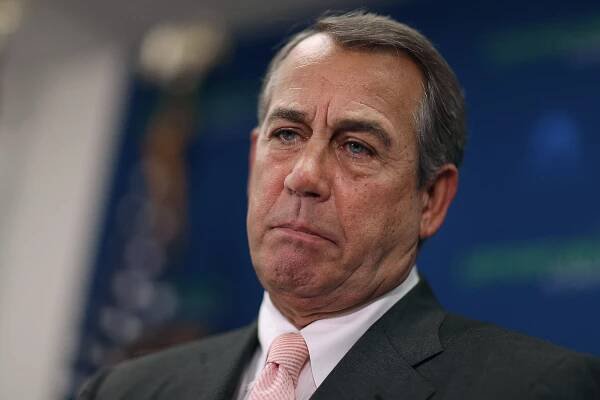 Speaker of the House John Boehner looks thrilled to speak in Washington.