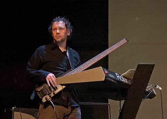 Jack Curtis Dubowsky, playing bass and Jupiter 6 at The Tank in NYC, April 2010