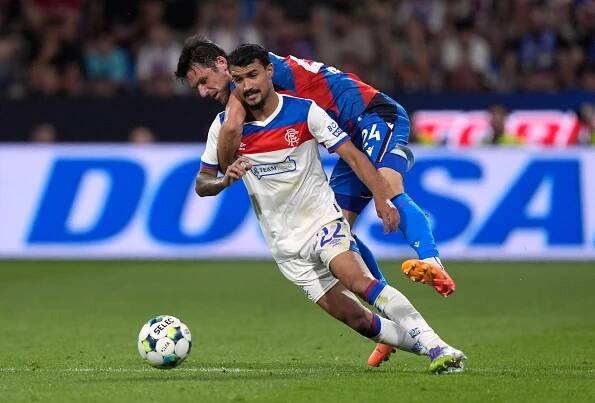 Jefte of Rangers FC challenged by Milan Havel of Viktoria Plzen.