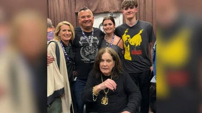 Louis Osbourne Pictured is Louis Osbourne with his wife, two children and Ozzy sat down in front of them while they gather around him smiling