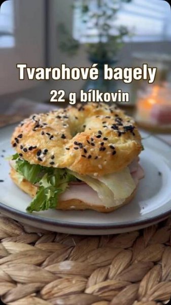 there is a bagel sandwich on the plate