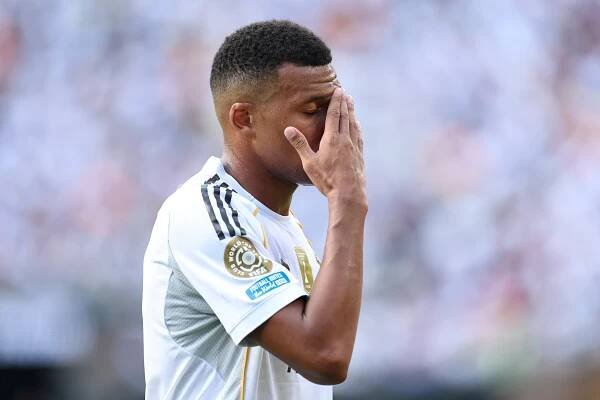 Kylian Mbappé of Real Madrid reacting during a soccer game.