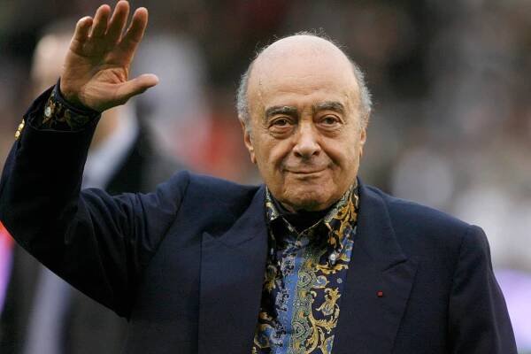 FILE - Fulham owner Mohamed Al-Fayed waves to the crowd before the English Premier League soccer match against Tottenham Hotspur at Craven Cottage stadium, London, Nov. 15, 2008. Al-Fayed, the former Harrods owner whose son Dodi was killed in a car crash with Princess Diana, has died at age 94. His death was announced Friday, Sept. 1, 2023, by Fulham Football Club, which Al-Fayed once owned. (AP Photo/Simon Dawson, File)