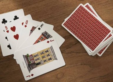 deck of playing cards with row house images