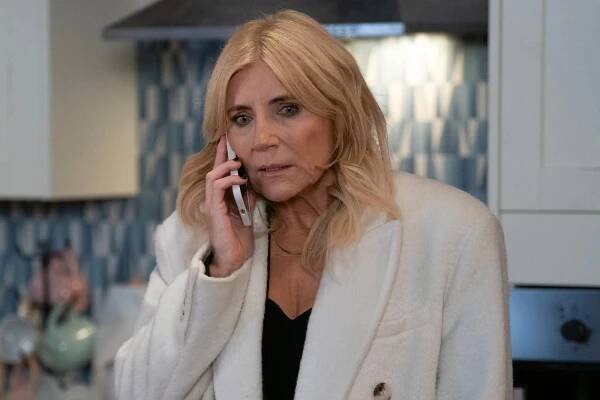 An image collage containing 1 images, Image 1 shows Michelle Collins as Cindy Beale on the phone in a kitchen
