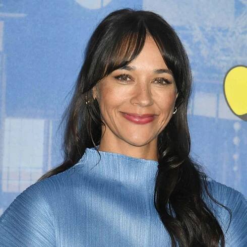 Rashida Jones with her hair styled with curtain bangs.