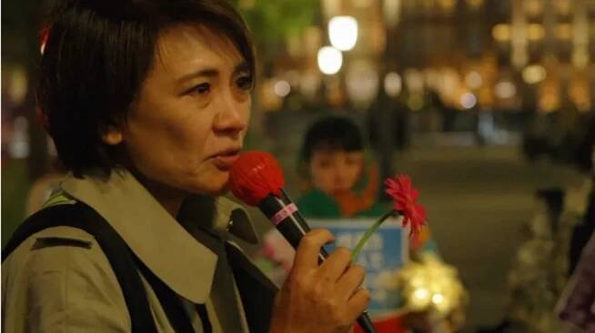 Minori Kitahara at a Flower Demo protest in Japan