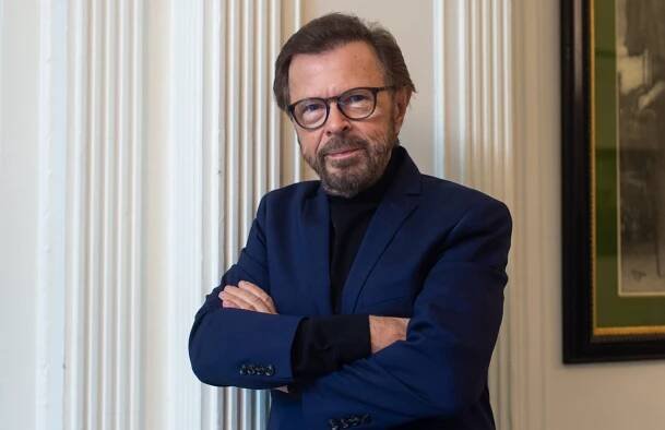 Björn Ulvaeus in a blue suit.