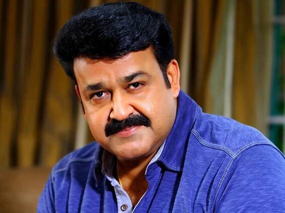 Hot Look And Smile Pics Of Mohanlal
