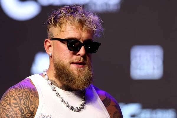 Jake Paul speaks during a press conference