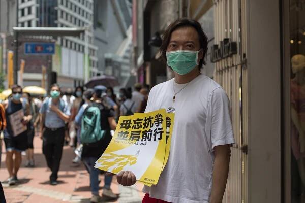 Defiance and fear as Hong Kong settles into new normal after China-backed law takes hold