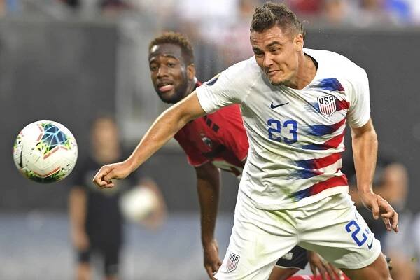 Aaron Long heads the ball for one of his two goals in the United States' 6-0 win over Trinidad and Tobago in Saturday night's Gold Cup.