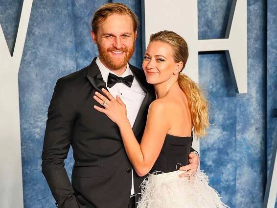 Wyatt Russell and Meredith Hagner attend the 2023 Vanity Fair Oscar Party on March 12, 2023 in Beverly Hills, California.