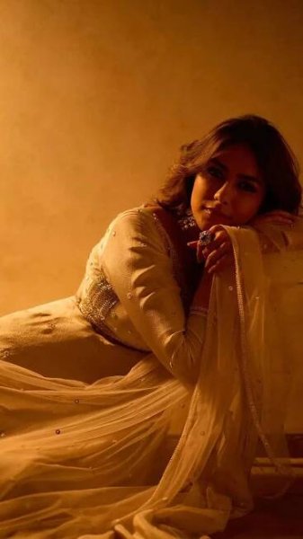 Mrunal Thakur dazzles in a beige Anarkali crafted from zari tissue