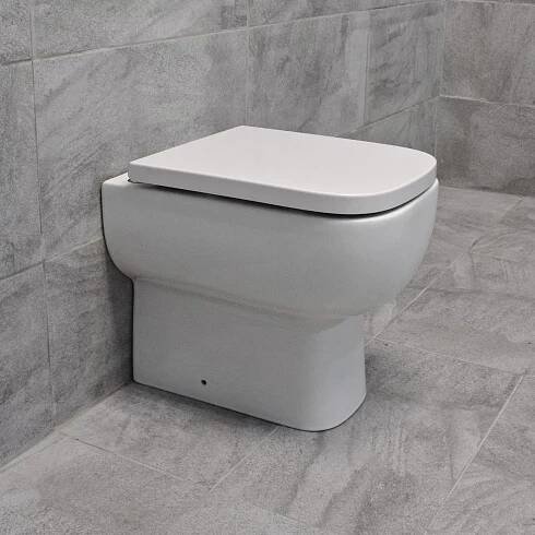 RAK Series 600 Rimless Back To Wall WC Pan with Soft Close Seat
