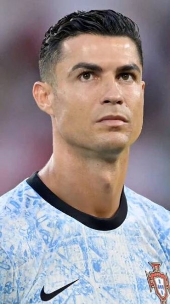 the soccer player is looking into the distance
