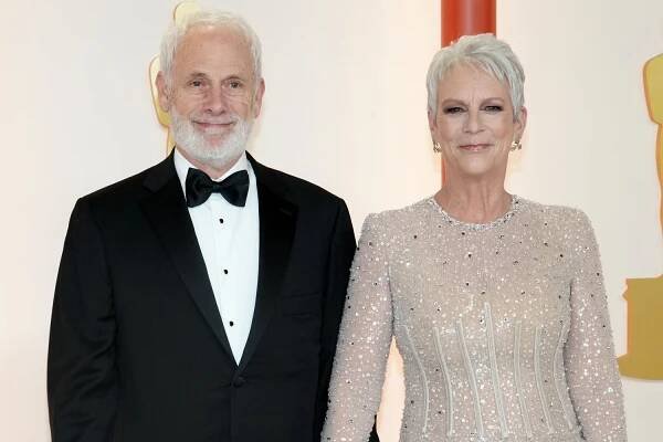Christopher Guest and Jamie Lee Curtis attend the 95th Annual Academy Awards on March 12, 2023 in Hollywood, California.