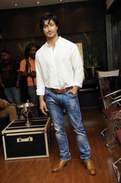 Caption: Vidyut Jamwal in Cool Denim Fashion Look Wallpaper