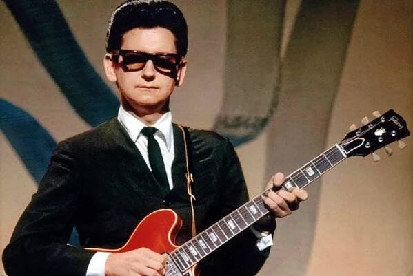 Roy Orbison with red guitar