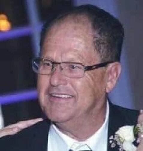 A headshot of a man.