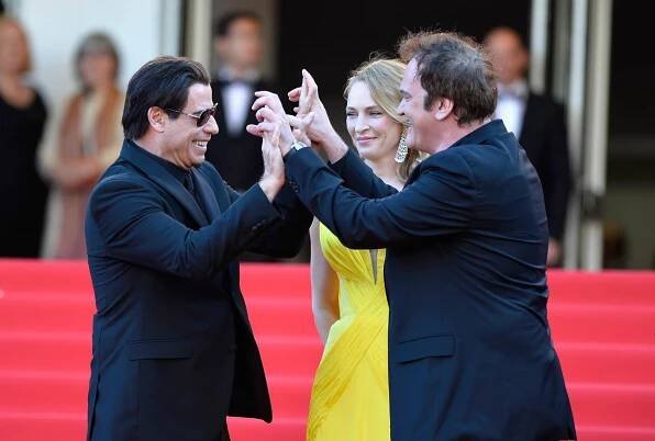 Quentin Tarantino, Uma Thurman, and John Travolta at an event for Pulp Fiction: Historky z podsvětí (1994)