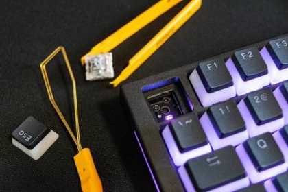 The GMMK Pro comes packaged with a switch and keycap puller, but the ones pictured here are sold separately.