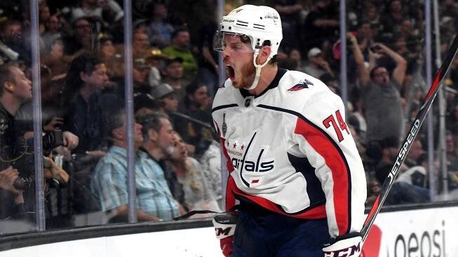 Washington Capitals' defenseman, John Carlson, in action. Wallpaper