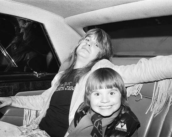 Lead singer Ozzy Osbourne, of Black Sabbath, pictured in a car with son Louis Osbourne. 3rd August 1981.