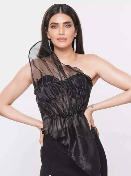 Karishma Tanna serves sheer elegance in black one-shoulder gown