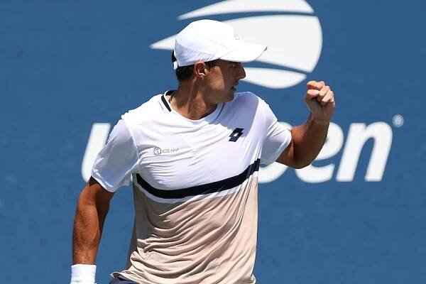 Adam Walton clenches his fist to celebrate winning a point at the US Open.