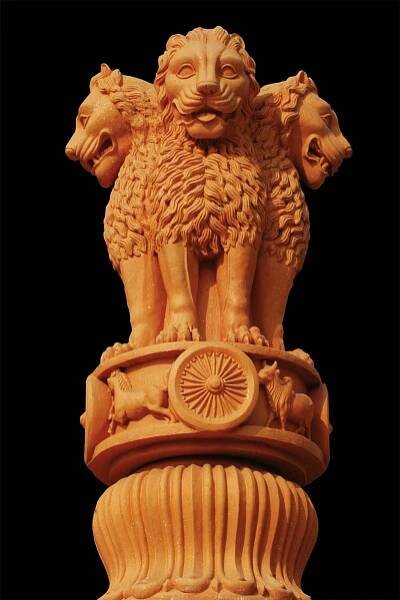 India’s national emblem shows three lions back-to-back on a pillar.