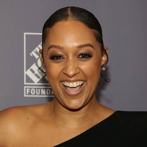 France Wasn't Ready for Tia Mowry's Waist-Length Caramel Cornrows – See Video