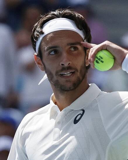 Musetti battles back to beat Mpetshi Perricard at US Open