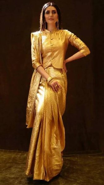 Karishma Tanna stuns in a breathtaking golden saree