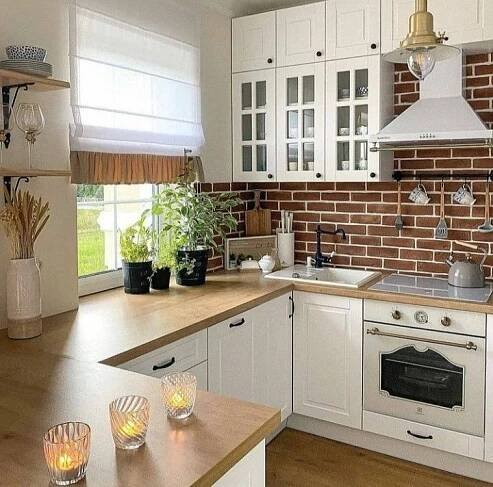 Rustic Kitchen with White Cabinets and Wooden Countertops