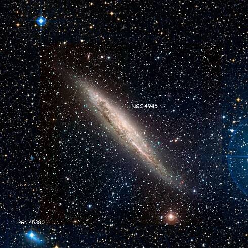 ESO image of region near spiral galaxy NGC 4945 overlaid on a DSS background to fill in missing areas; also shown is PGC 45380, also known as NGC 4945A