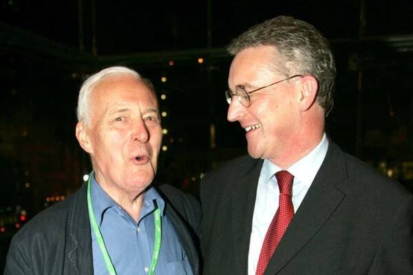 Hilary Benn embraces his father at a New Statesman party