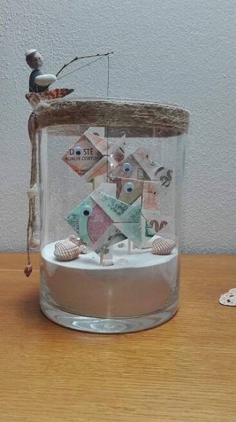 there is a glass jar with some things in it
