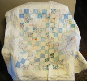 Mom made this baby quilt from chicken feed sacks. In 1946 fabric was still difficult to obtain. flour, chicken feed and other commodities came in printed cotton sacks.