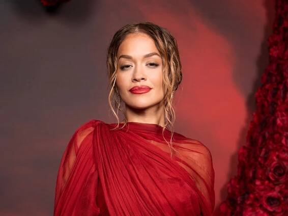 Rita Ora's racy red lace crop top and low-rise midi skirt combo is a heatwave dressing dream
