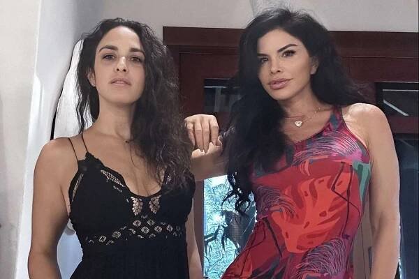 Lauren Sánchez and sister Elena pose for a photo together.